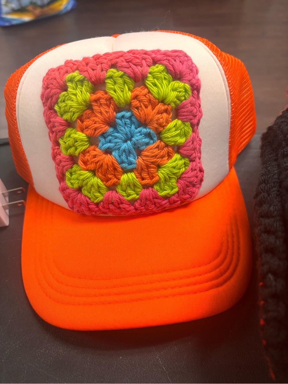Bright Orange Trucker Hat with Colorful Crochet Patch